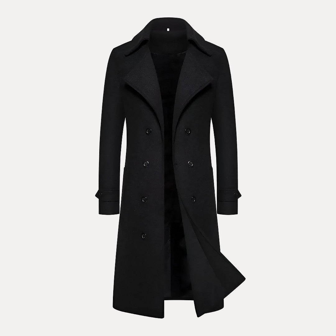Sophisticated dark gray men's double-breasted long winter coat. Features sharp peak lapels and a tailored fit.