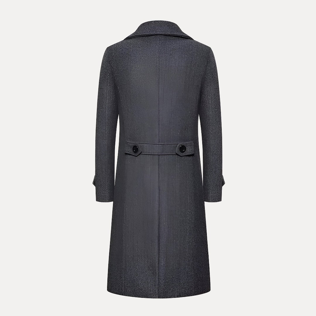 Formal men's double-breasted long winter coat. Tailored fit overcoat with elegant peak lapels for business wear.