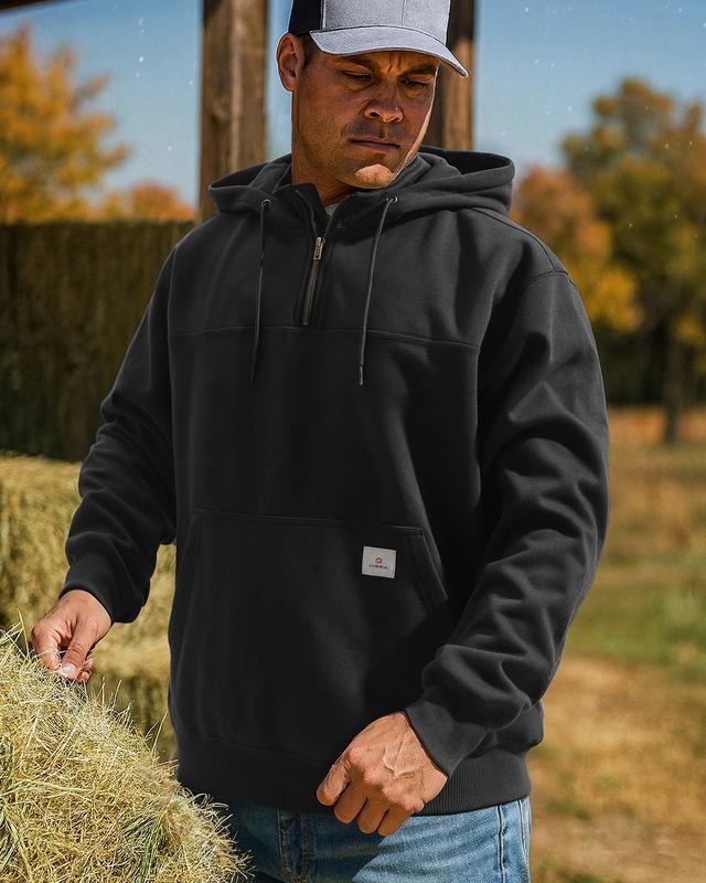Men's Dryline work hoodie ensures you stay dry. Durable, water-resistant half-zip for outdoor comfort & activewear.