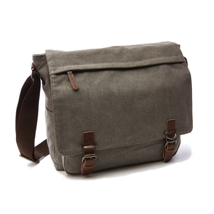 Robust men's messenger bag with strong buckle straps, ideal as a work bag, school bag, or travel crossbody.