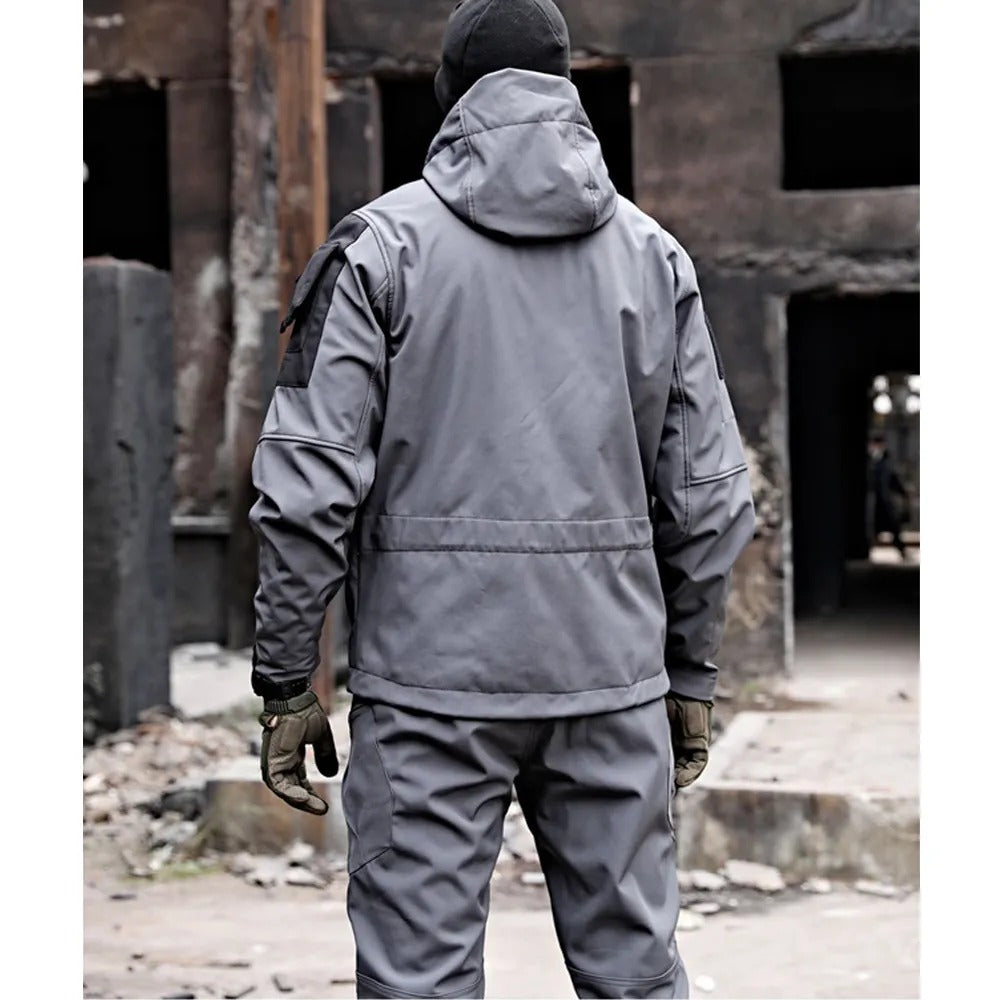 Men's durable outdoor adventure set with windproof jacket & pants, perfect for hiking & camping.