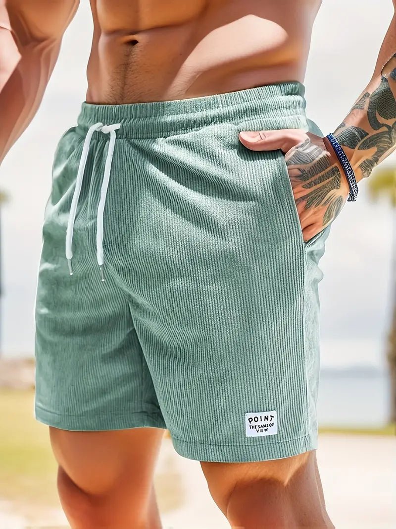 Classic men's swim shorts, solid color, elastic waist design for beach, pool, and summer.