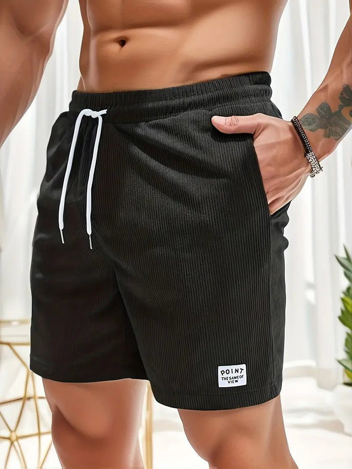 Relaxed fit men's quick-dry swim shorts, elastic waist for comfortable summer pool & beach days.