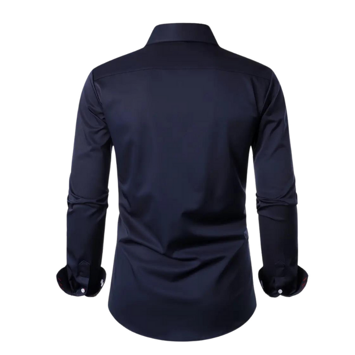 Model in men's elegant party shirt in a dynamic pose, showing comfort & flexibility for dancing. Slim fit fashion.