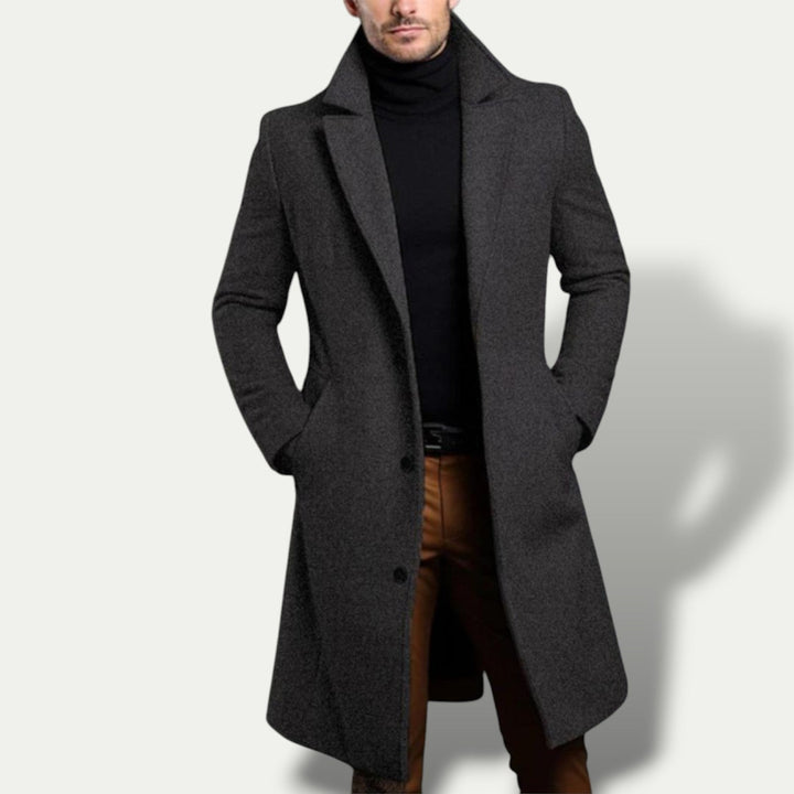 Stylish men's long single breasted coat, versatile for smart casual or formal wear, tailored fit outerwear.