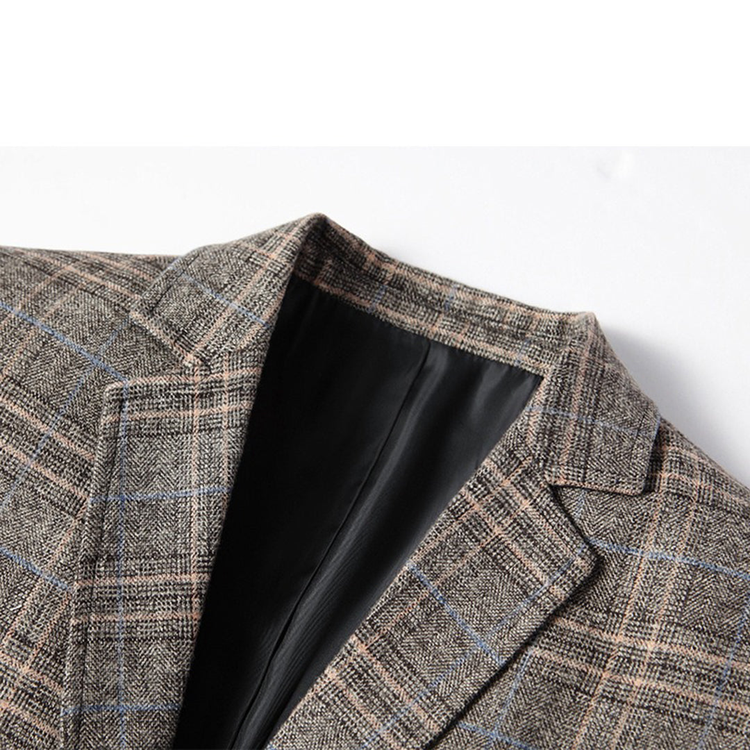 Front view of an elegant men's slim fit blazer, intricate embroidery making it ideal for formal evening wear.