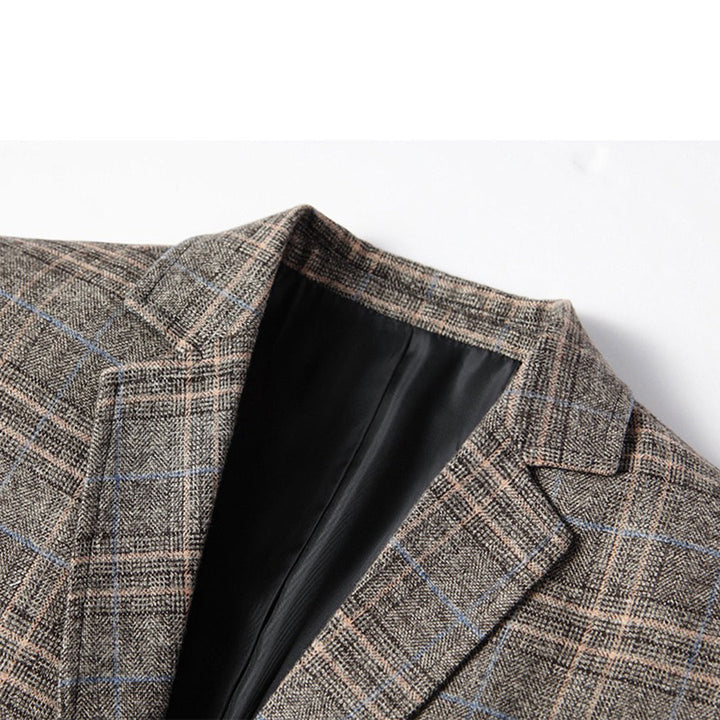 Front view of an elegant men's slim fit blazer, intricate embroidery making it ideal for formal evening wear.