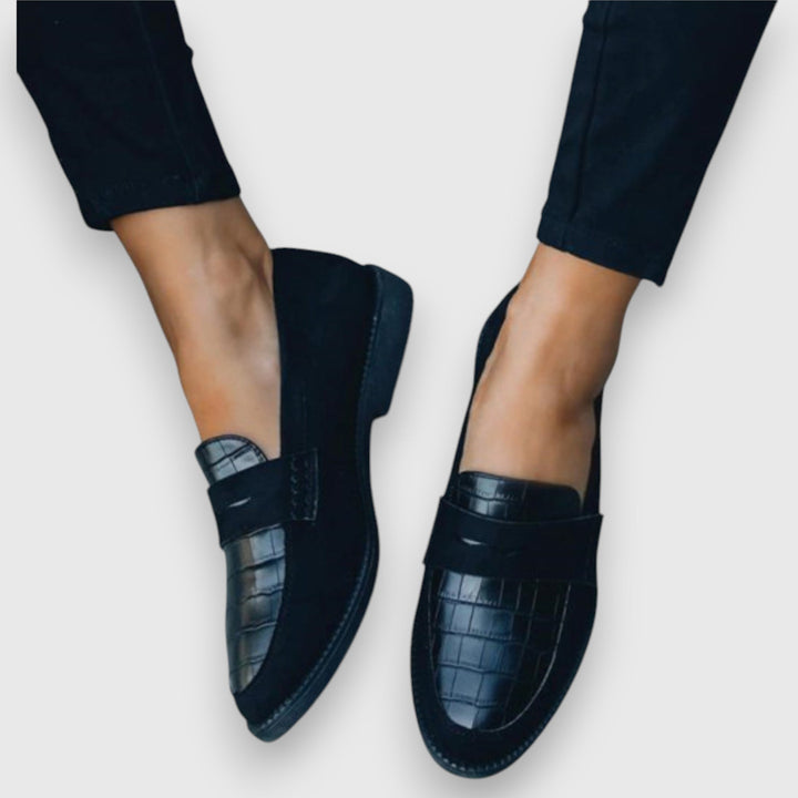 Men's ergonomic black slip-on loafers for all-day comfort. Versatile for business casual & smart casual.