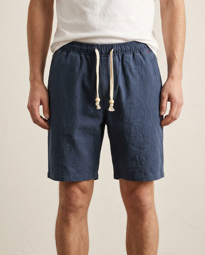 Relaxed fit men's athletic gym shorts with drawstring, ideal for active lifestyles, running, and workouts.