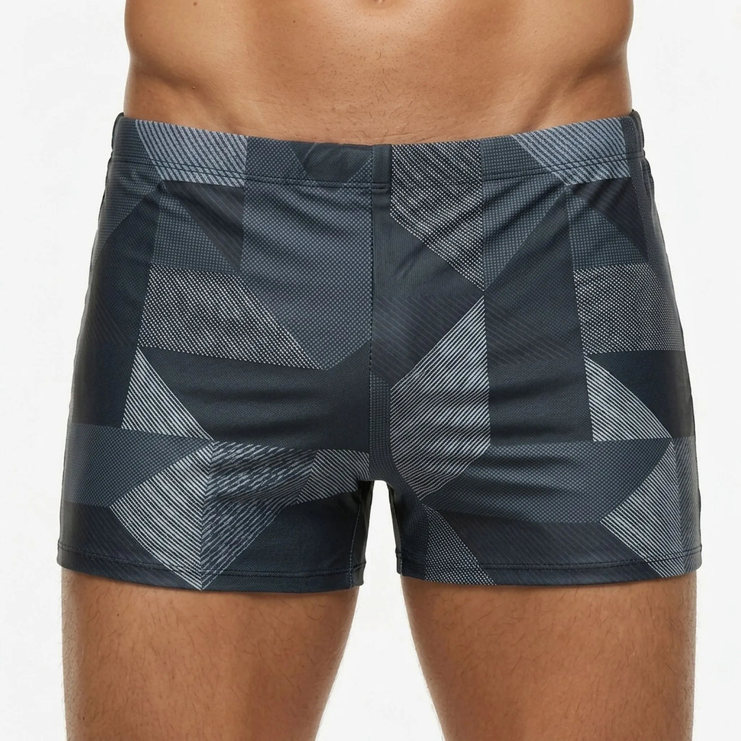 Sporty men's fitted swim trunks, perfect for athletic swimming, beachwear & active water sports.