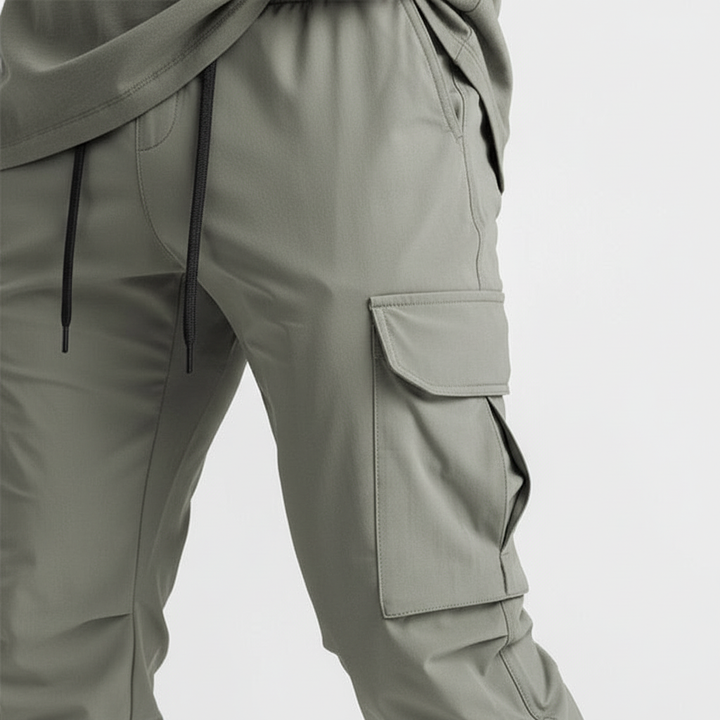 Multi-pocket men's cargo joggers. Flexible fit, comfortable stretch fabric for urban style & everyday wear.