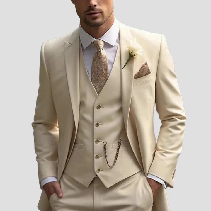 Close-up of the fabric texture on a men's tailored three-piece suit, highlighting its premium quality and slim fit.