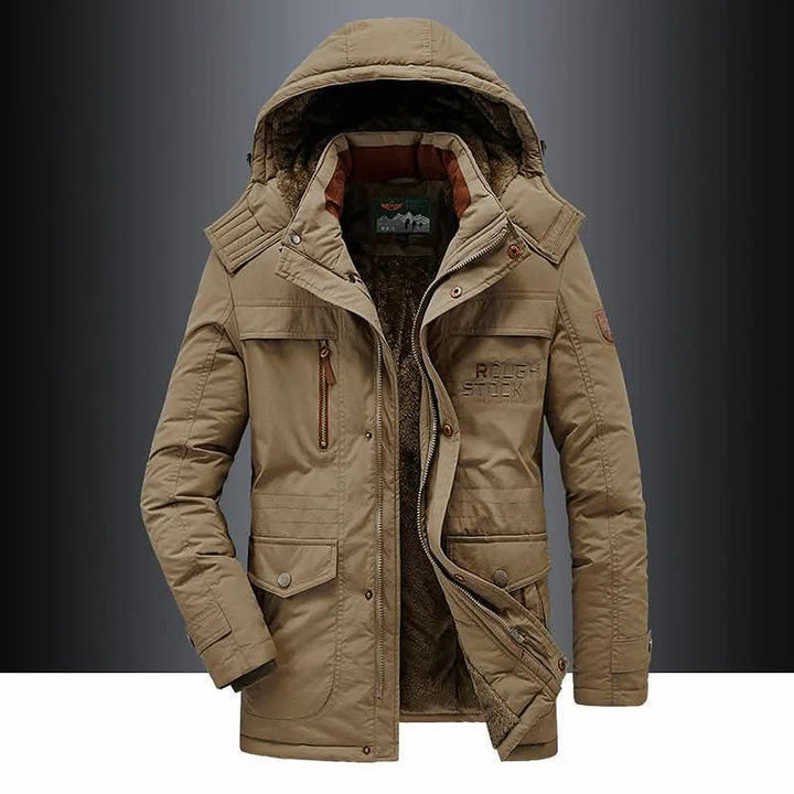 Side view of men's FrostGuard insulated winter parka. Padded coat with rugged design for extreme cold protection.