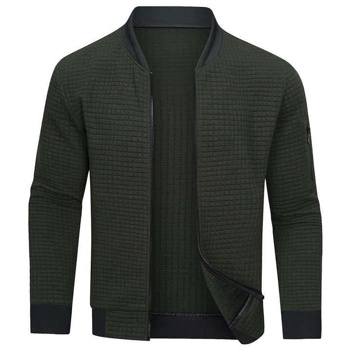 Close-up of a men's full-zip textured grid cardigan, showcasing the intricate pattern and soft fabric.