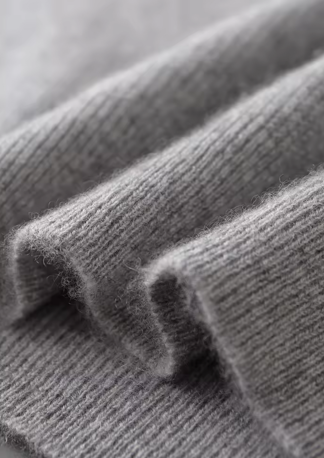 Stylish men's crew neck vest. Versatile sleeveless layering piece for smart casual or daily wear.