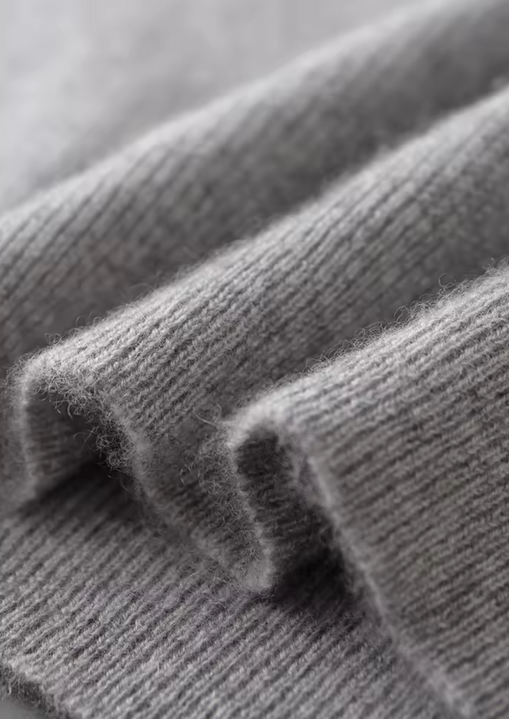 Stylish men's crew neck vest. Versatile sleeveless layering piece for smart casual or daily wear.