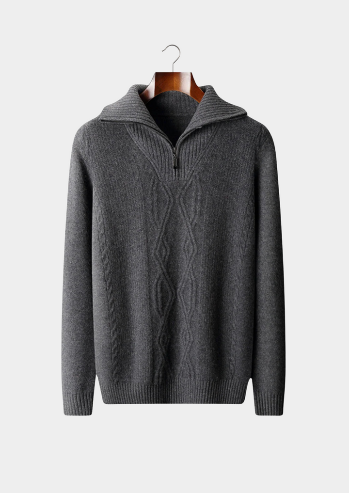 Comfortable men's cable knit sweater with half zip closure. Ideal for casual, all-season styling. Soft, long-sleeve knit top.