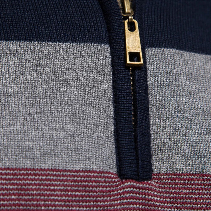 Men's bold striped knitted half zip pullover sweater. Essential long sleeve top for casual fall & winter wear.