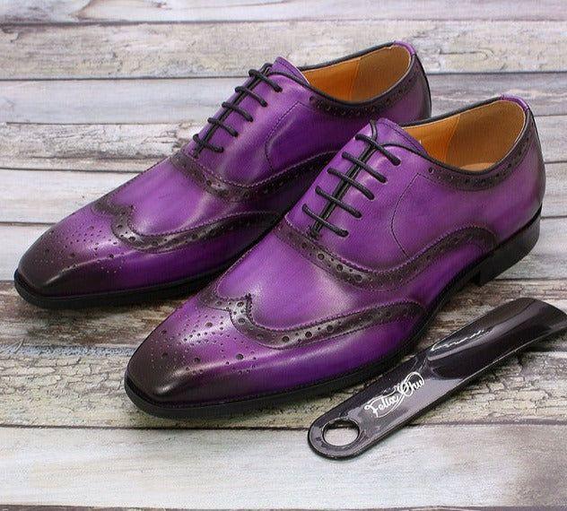 High-quality men's handcrafted leather wingtip Oxford brogue shoes with intricate detailing.
