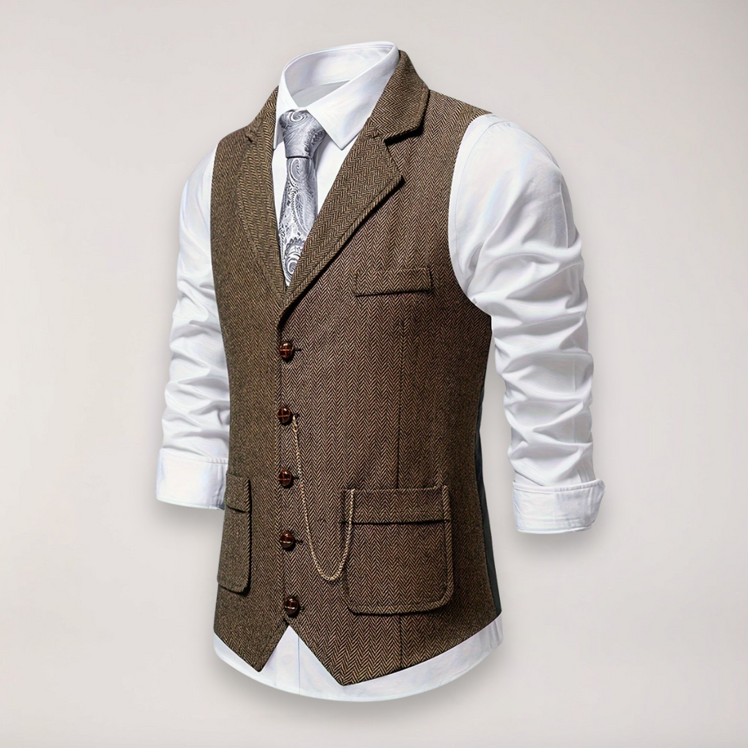 Men's formal wear: Herringbone vest with a reversed collar, styled for a sharp and distinguished look.