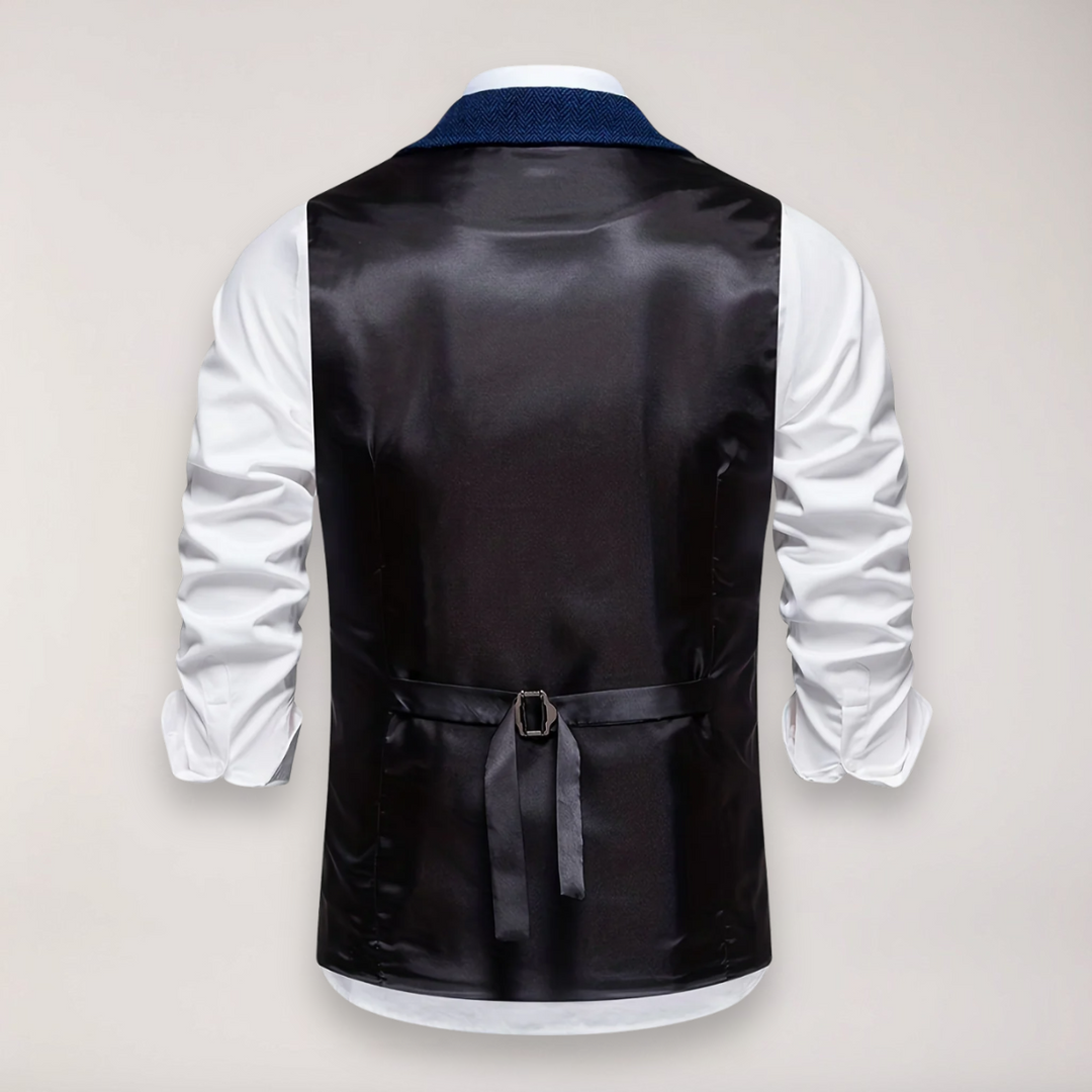 Elegant men's apparel: Herringbone waistcoat, classic fit with a reversed collar, suitable for special occasions.