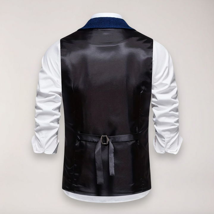 Elegant men's apparel: Herringbone waistcoat, classic fit with a reversed collar, suitable for special occasions.