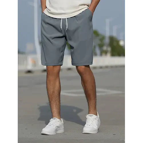 Men's high-rise, relaxed-fit summer shorts with drawstring, ideal for casual comfort & warm weather.