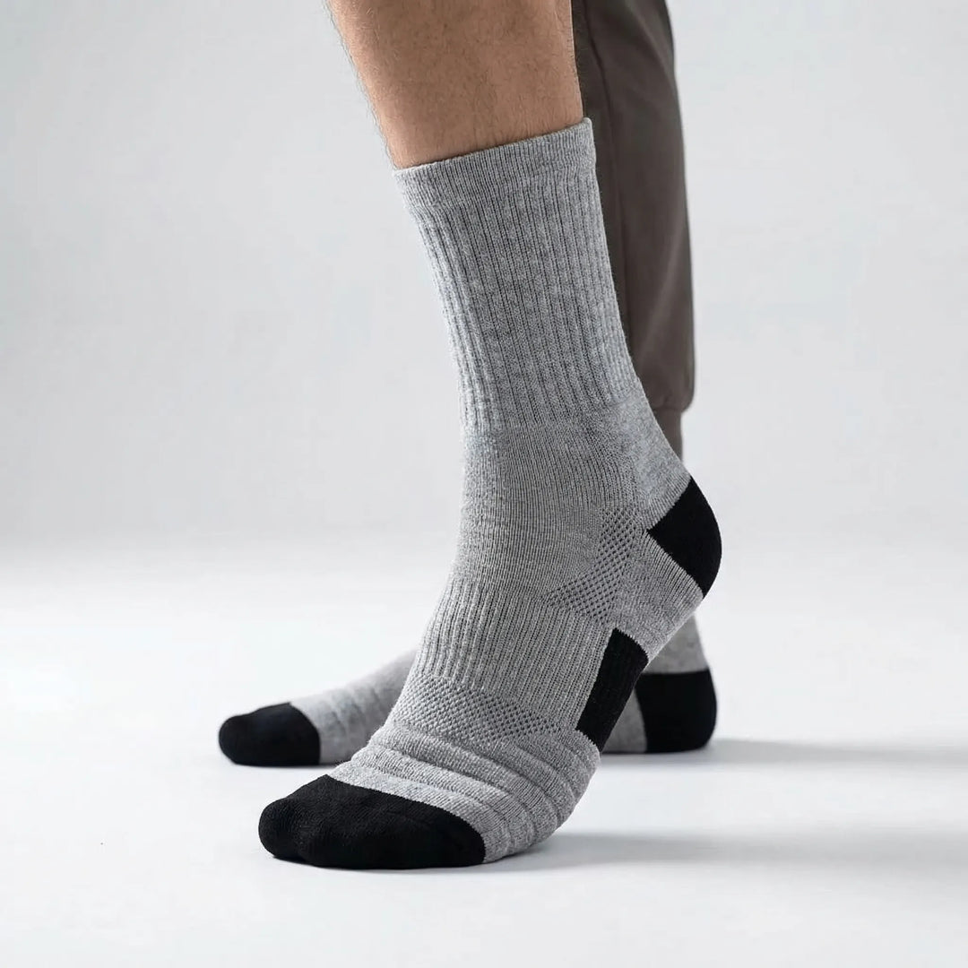Moisture-wicking men's high-tube athletic socks, ideal for gym workouts & activewear.