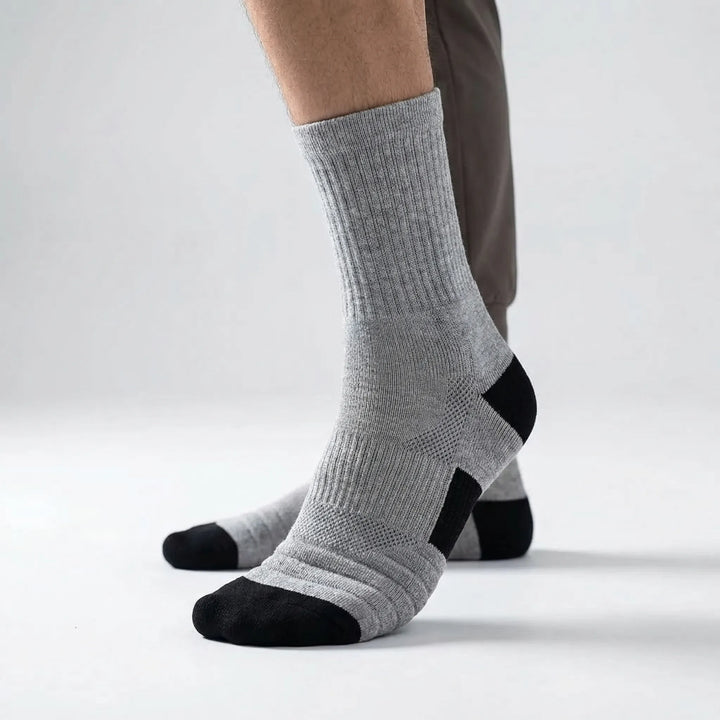 Moisture-wicking men's high-tube athletic socks, ideal for gym workouts & activewear.