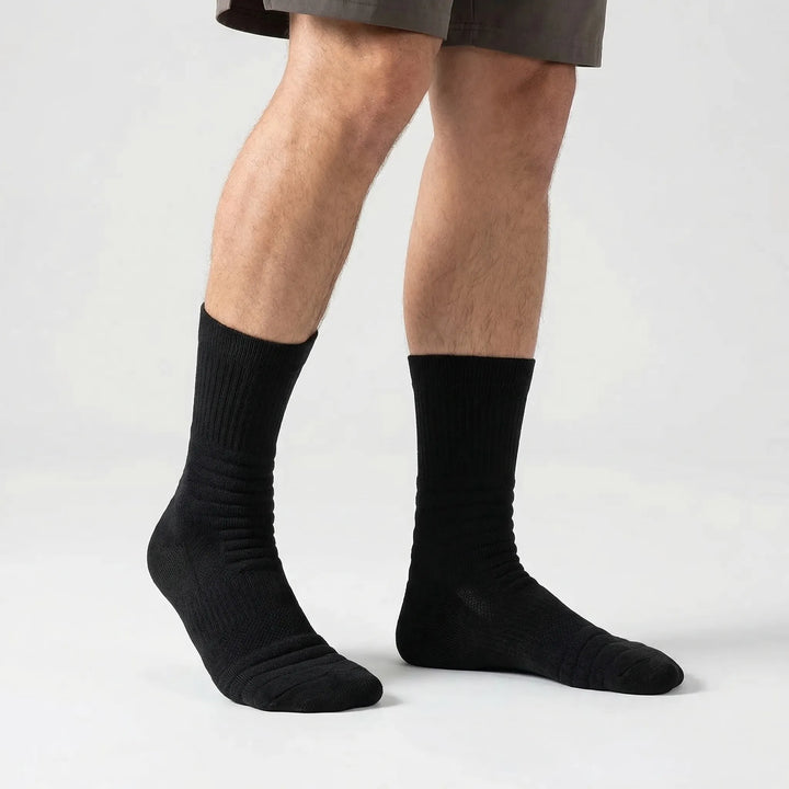 High-tube men's workout socks with compression for enhanced support during sports & gym.