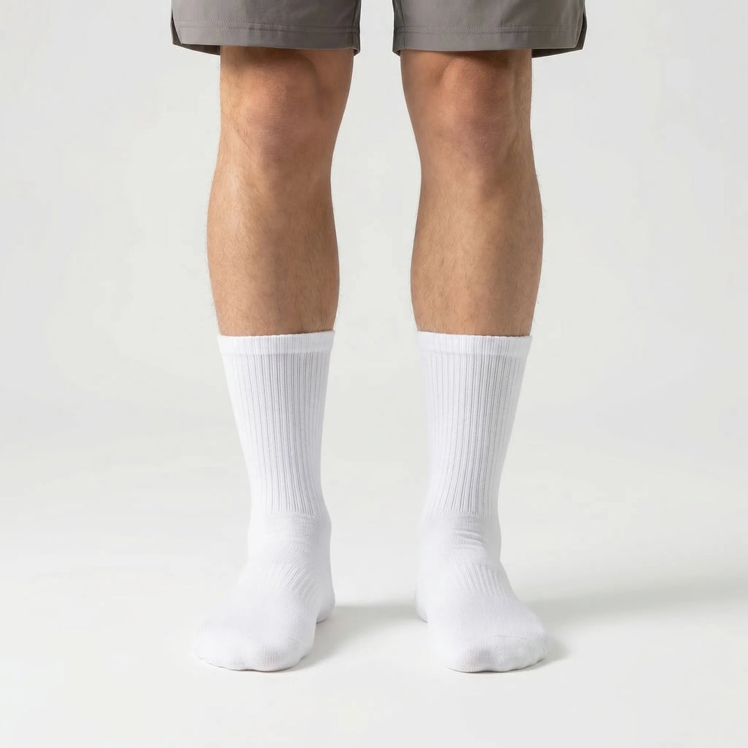 Activewear men's sports socks, high-tube design with moisture-wicking compression for athletes.