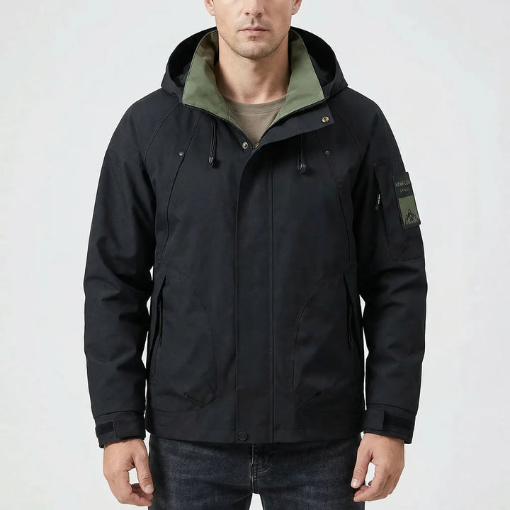 Protective men's hooded softshell windbreaker. Lightweight rain jacket for hiking, travel, and outdoor adventures.