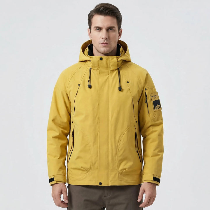 Versatile men's hooded softshell windbreaker jacket. Lightweight, rain-resistant outdoor gear for hiking & travel.