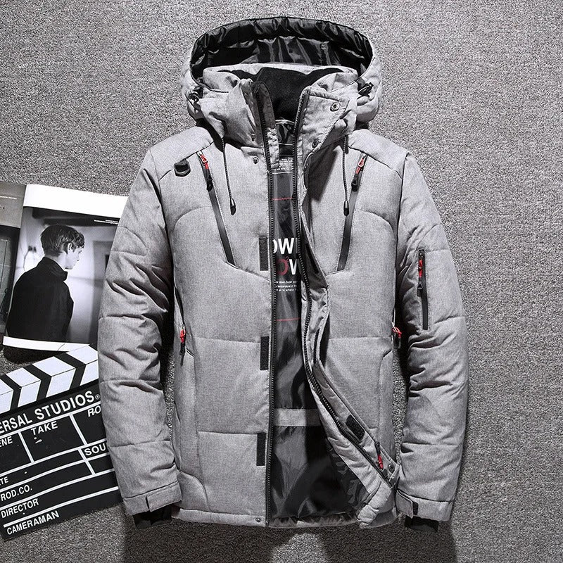 Detail of the quilted insulation on a men's puffer parka. Provides superior warmth, a key feature for winter outerwear.