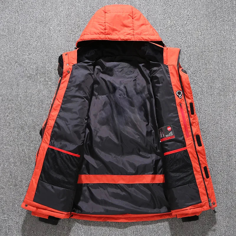 Men's insulated hooded parka in a snowy environment. Conquer cold with this warm, protective winter outerwear jacket.