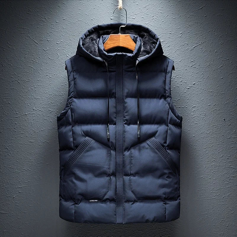Men's insulated hooded puffer vest. Lightweight outerwear ideal for cold weather protection & casual layering.
