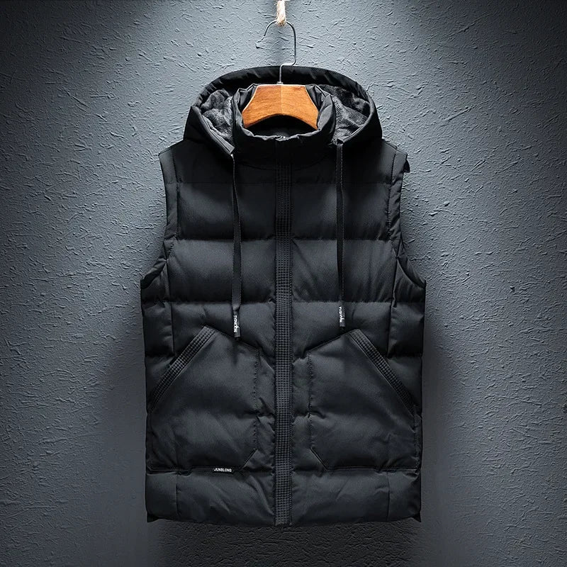 Comfortable men's insulated hooded puffer vest. Essential lightweight outerwear for cold weather & everyday protection.