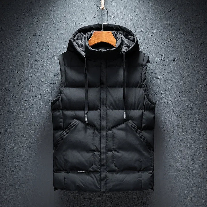 Comfortable men's insulated hooded puffer vest. Essential lightweight outerwear for cold weather & everyday protection.