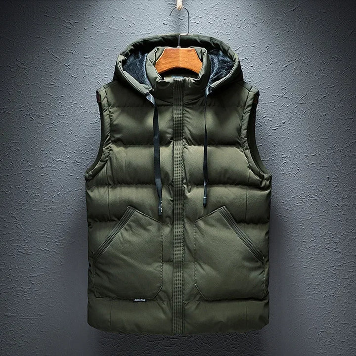 Men's quilted insulated hooded puffer vest. Lightweight and warm outerwear for cold weather protection & outdoor activities.