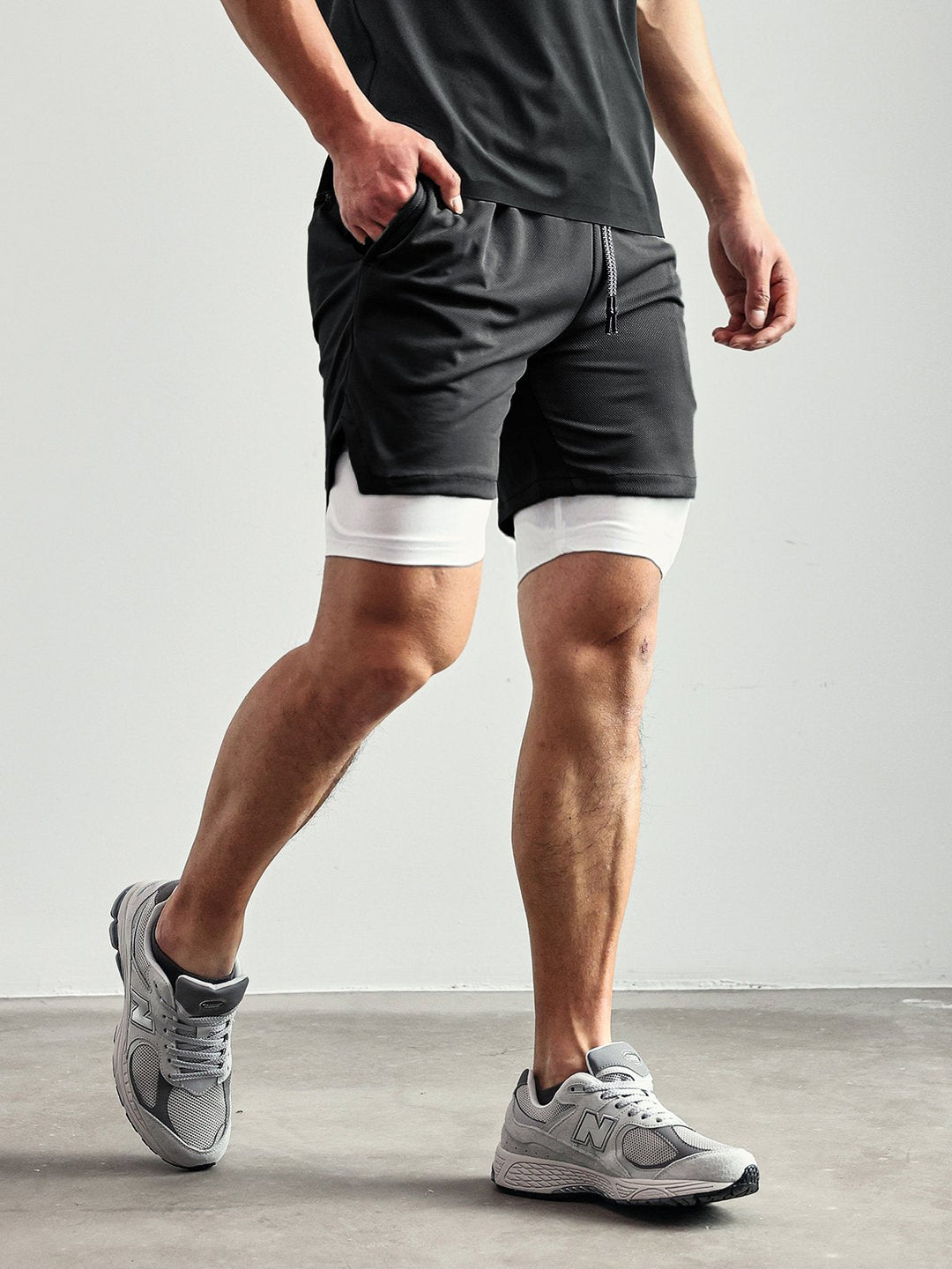Black Men's Kinetic Mesh shorts. Essential activewear for gym & training performance.