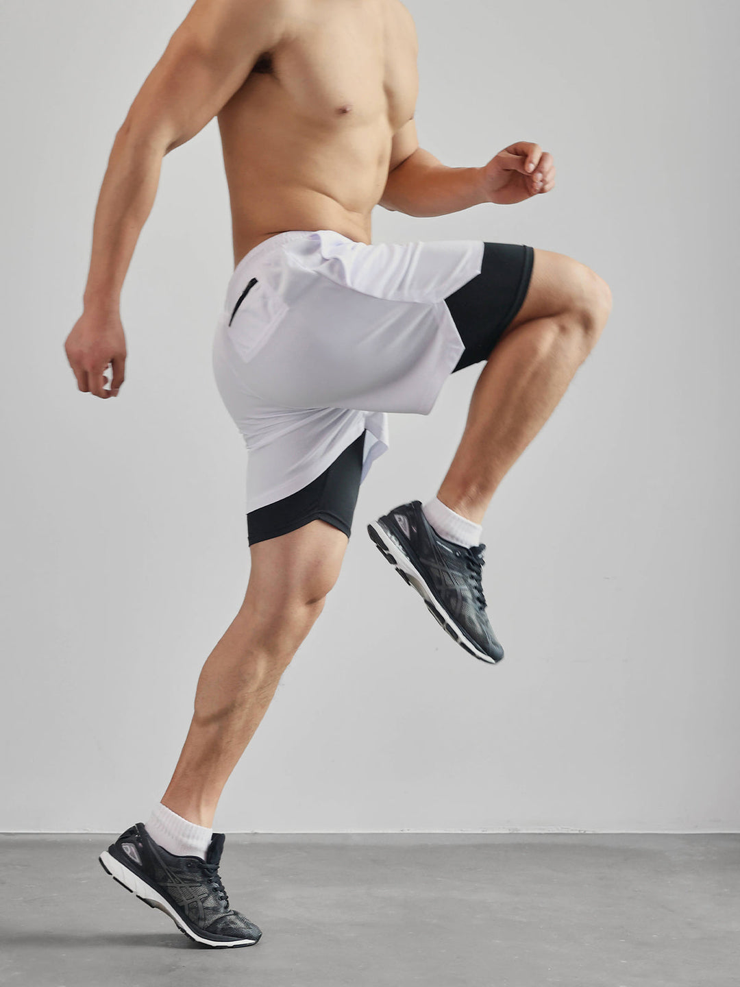 Men's Kinetic Mesh training shorts with practical pockets for essentials during workouts.