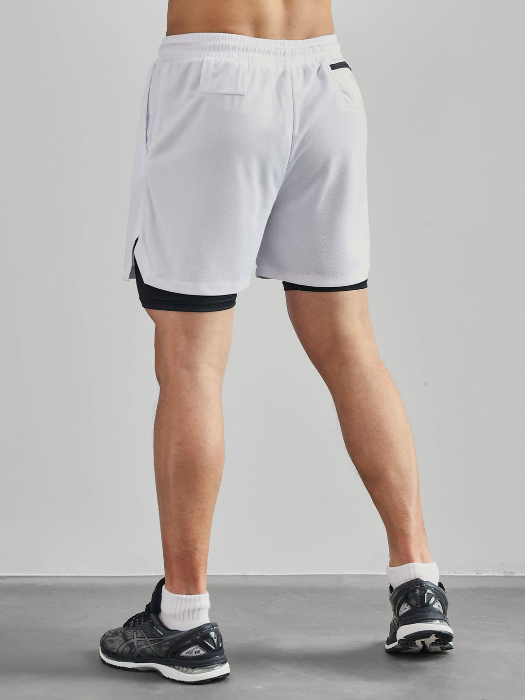 Men's Kinetic Mesh shorts paired with a performance top, ready for gym & active training.