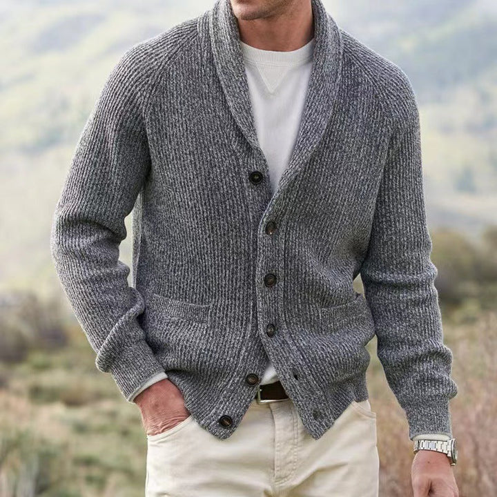 Men's knit cardigan with a stylish shawl collar, perfect for casual or smart casual layering. Timeless fall/winter wear.