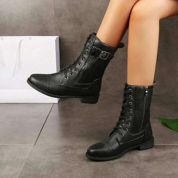 Durable men's lace-up boots featuring a convenient zipper and robust sole, ideal for all-day comfort.