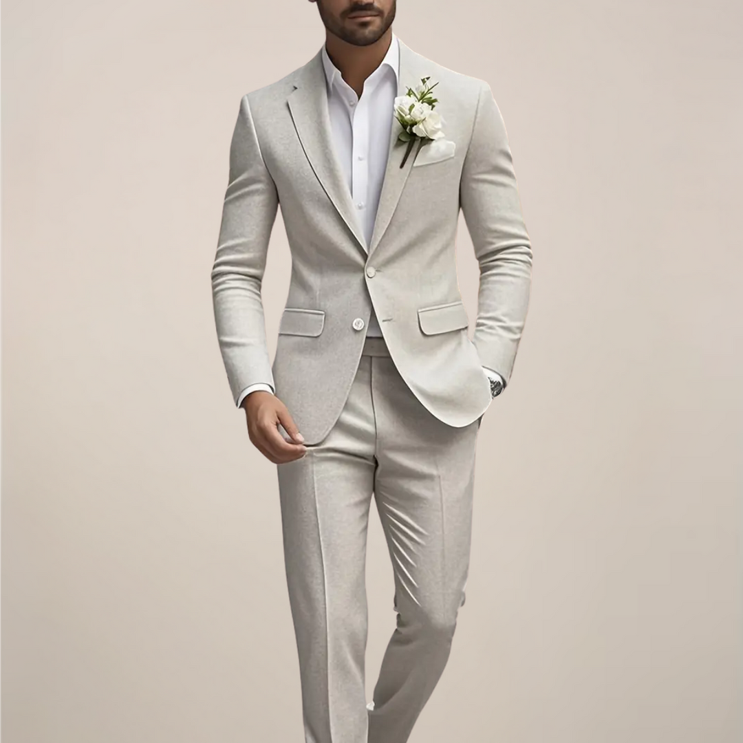 Men's light-gray slim fit wedding suit, ideal for urban grooms & modern formal occasions. Tailored attire.