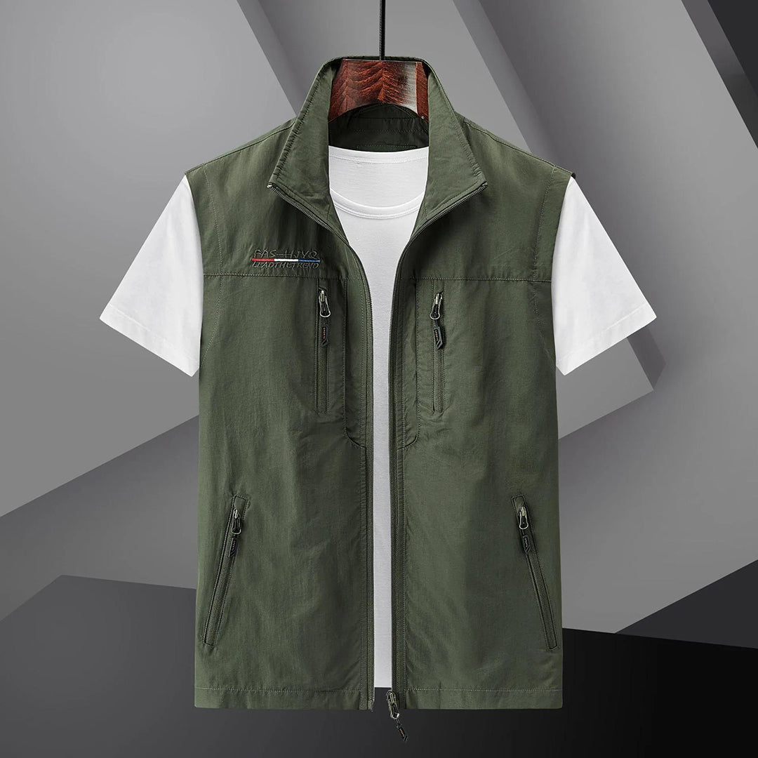 Lightweight men's adventure vest with secure zip pockets, essential outdoor gear for hiking, travel & fishing.