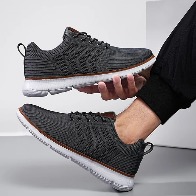 Pair of Men's Stride Airmesh walking shoes, black/grey, offering ultimate comfort & lightweight design.