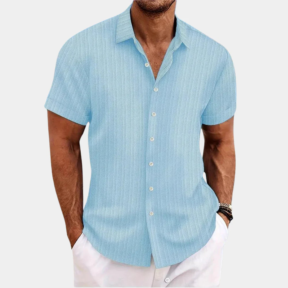 Short sleeve men's regular fit button-up shirt, ideal for warm weather and everyday style.