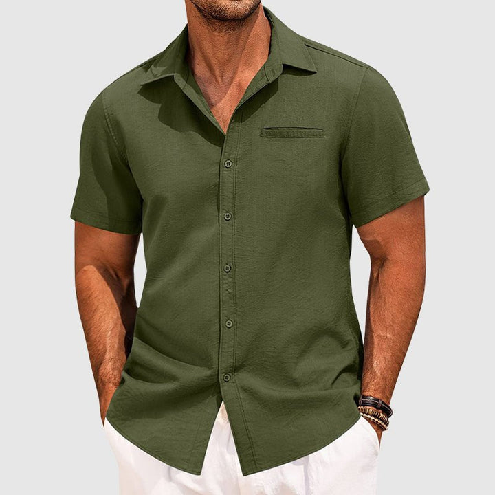 Men's lightweight button-down summer shirt with short sleeves and lapel collar. Perfect for casual wear.