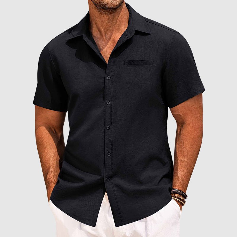 Stylish men's lightweight short sleeve button-down summer shirt. Features lapel collar & chest pocket for casual comfort.